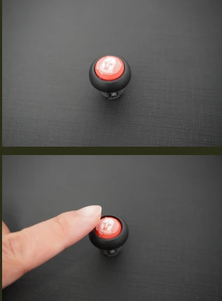 Two photographs of a red unit marker, before and during a press.